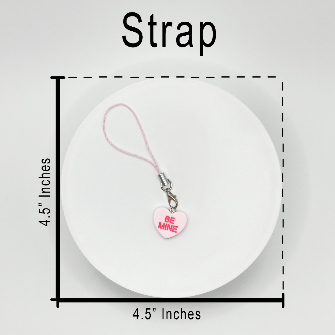 This versatile candy heart charm can be used as a phone charm or keychain and can be attached to phones, bags, purses, etc.. With a sturdy strap, ring, and hook, it's easily interchangeable for any purpose.