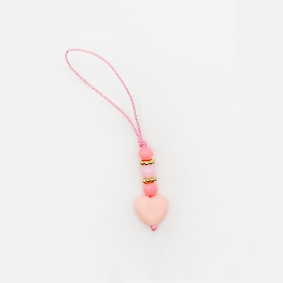 This versatile heart charm can be used as a phone charm or keychain and can be attached to phones, bags, purses, etc.. it's easily interchangeable for any purpose.