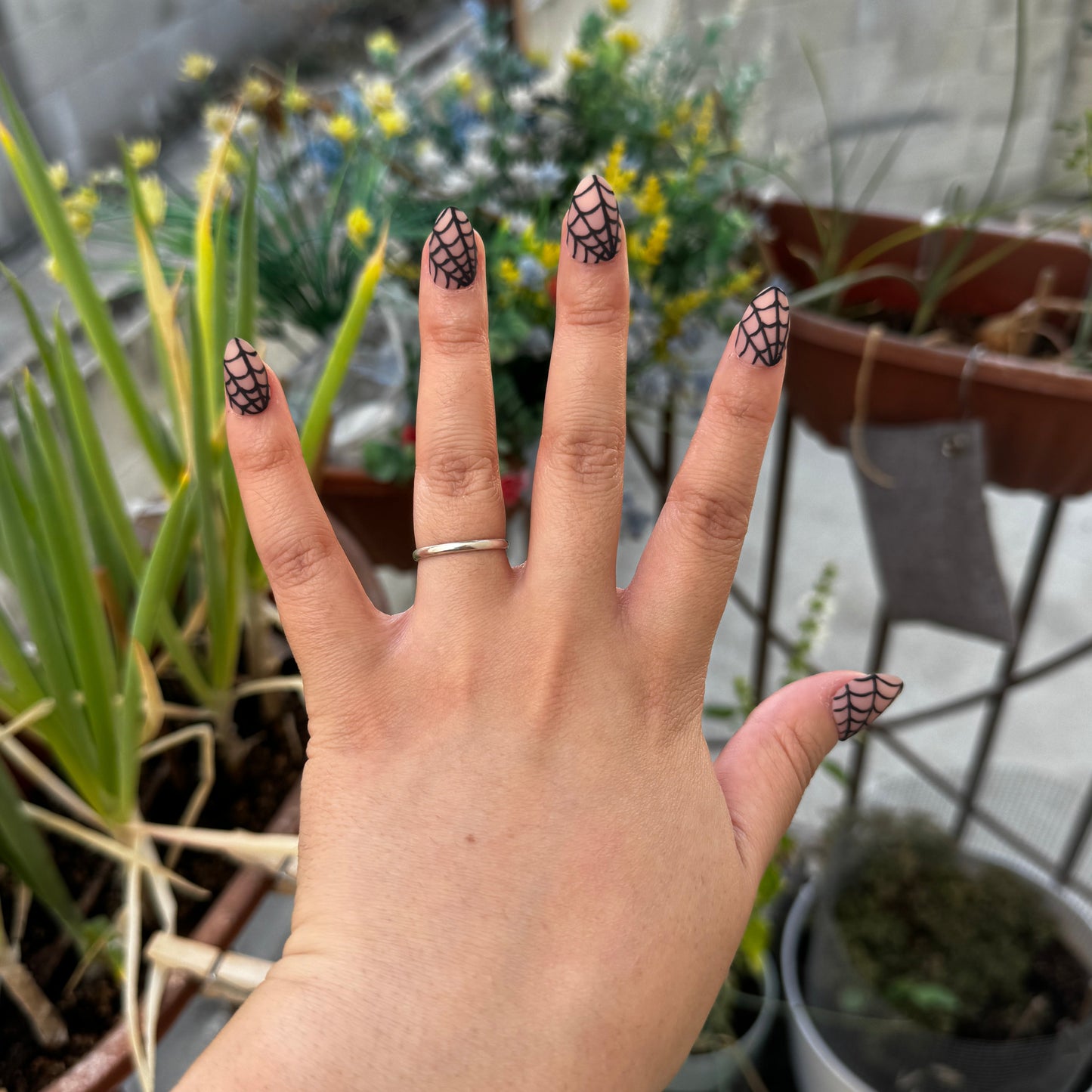 Get ready for "Nude Web" with these stunning, spiderweb design press-on nails. Featuring a nude base and black web with a matte finish. Each set is a miniature work of art, meticulously designed and hand-painted, adding a unique flair to any occasion. No time for salon appointments? Say hello to instant glamour that’s ready whenever you are. Our durable, high-quality press-ons offer a flawless, comfortable fit and are designed to last.