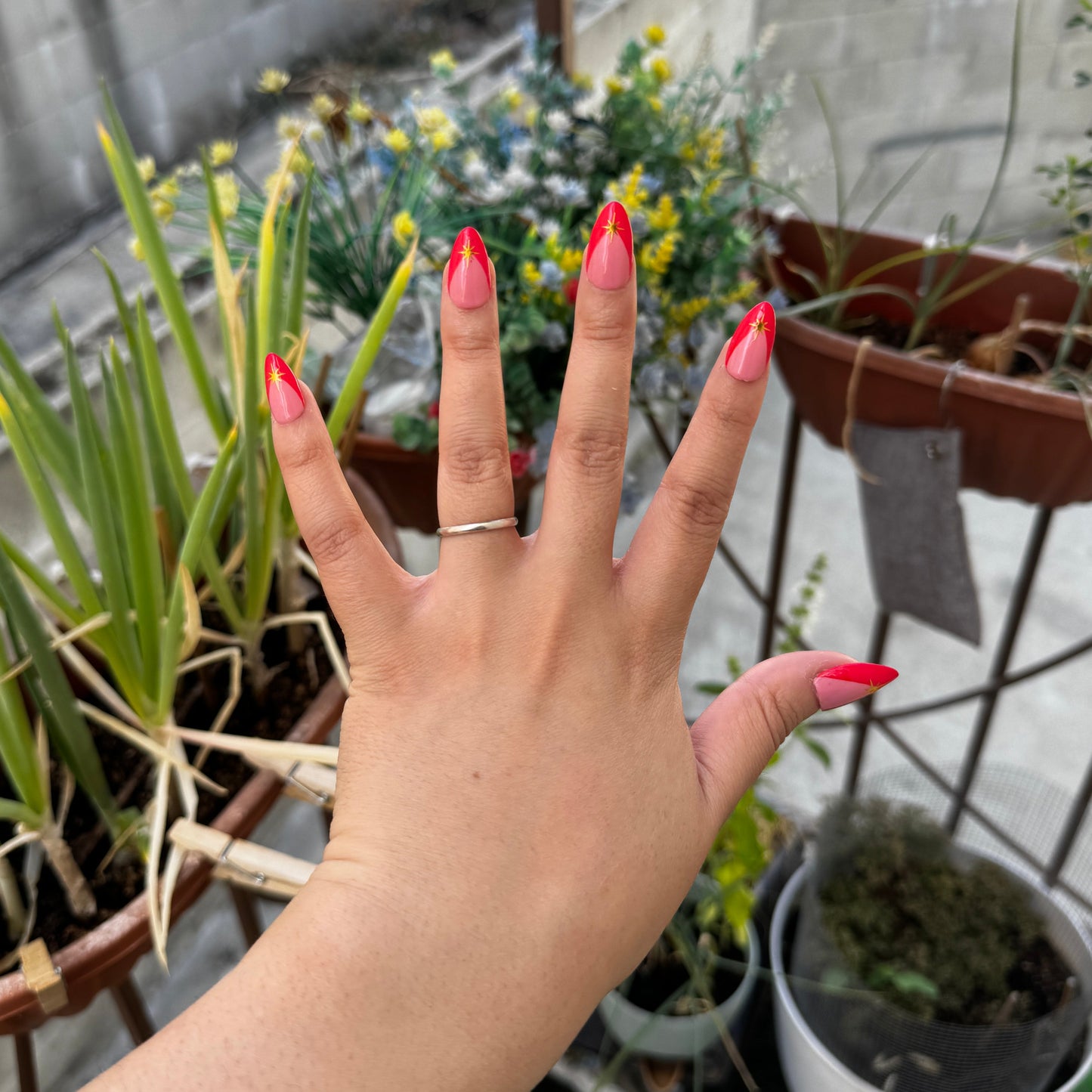 Get ready for "Red Retro Starburst" with these stunning, retro starburst design press-on nails. Featuring a pink base, red french tip design, and gold starbursts with a glossy finish. Each set is a miniature work of art, meticulously designed and hand-painted, adding a unique flair to any occasion. No time for salon appointments? Say hello to instant glamour that’s ready whenever you are. Our durable, high-quality press-ons offer a flawless, comfortable fit and are designed to last.