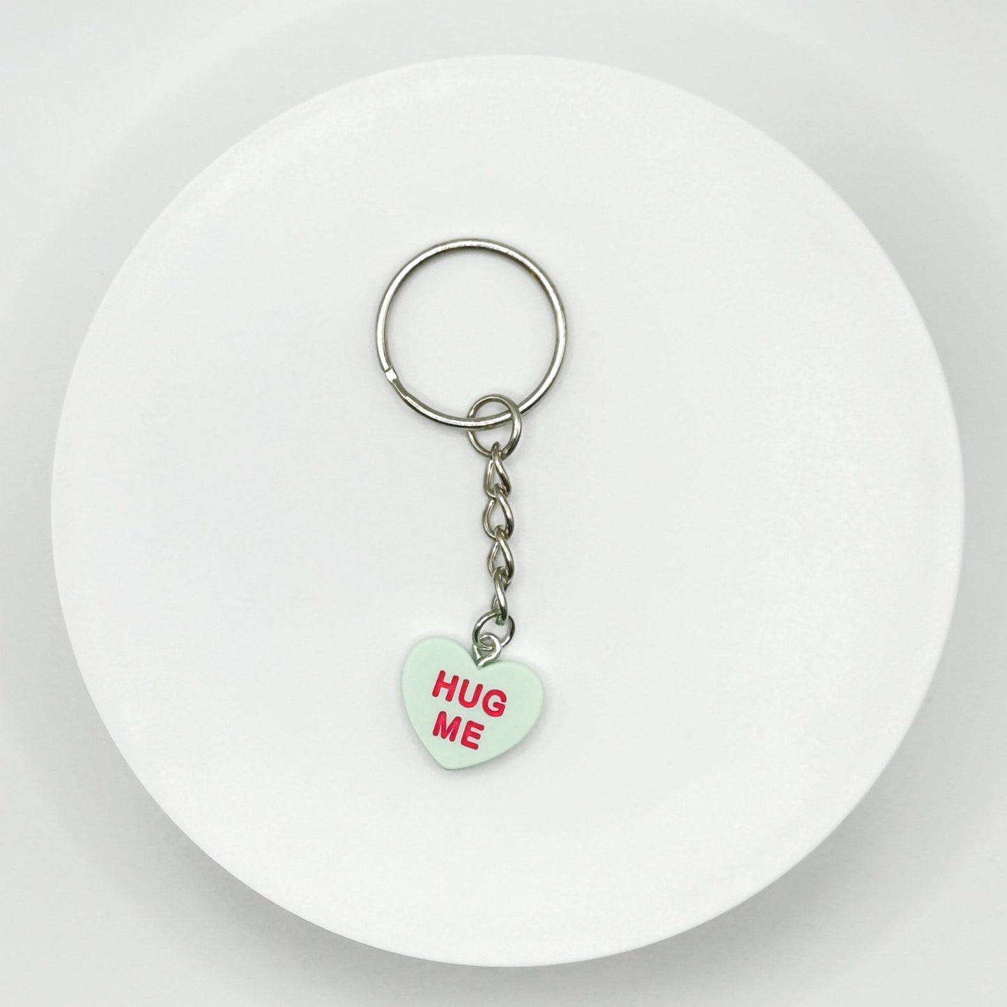 Add a touch of sweetness to your everyday! Our green candy heart phone charm and keychain is the perfect accessory for Valentine’s Day and beyond. Cute, durable, and versatile, it’s the perfect gift for yourself or a loved one.