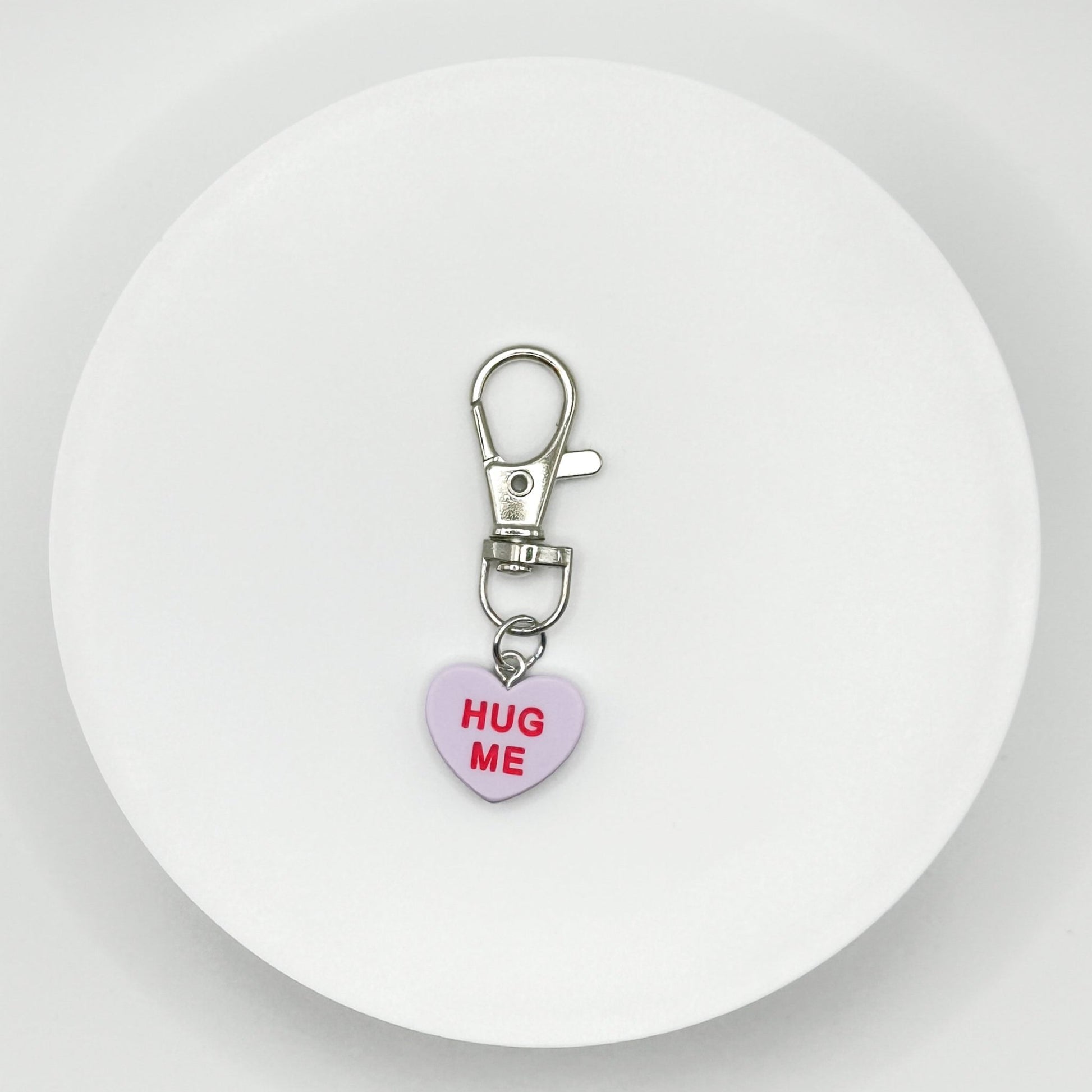 Add a touch of sweetness to your everyday! Our purple candy heart phone charm and keychain is the perfect accessory for Valentine’s Day and beyond. Cute, durable, and versatile, it’s the perfect gift for yourself or a loved one.