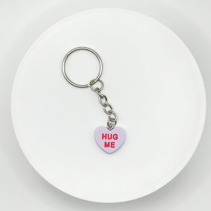 Add a touch of sweetness to your everyday! Our purple candy heart phone charm and keychain is the perfect accessory for Valentine’s Day and beyond. Cute, durable, and versatile, it’s the perfect gift for yourself or a loved one.