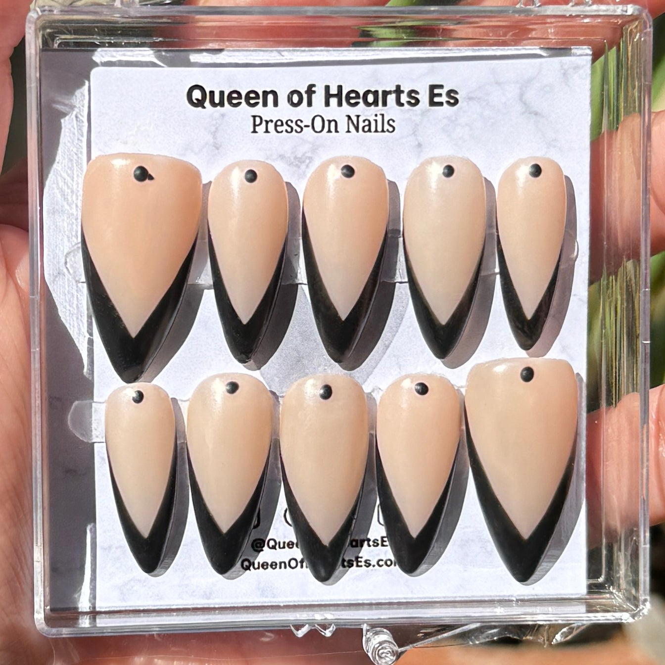 Get ready for "The Talons" and embrace dark glamour with these stunning handmade press-on nails, featuring a nude base and delicate, black tip design.&nbsp;
