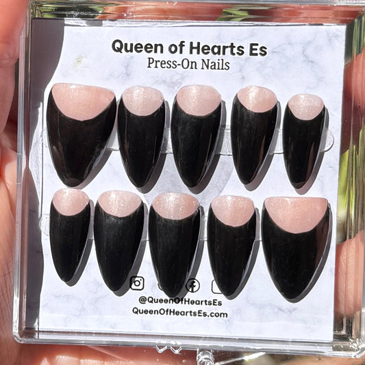 Get ready for "The Black Half Moon" and embrace dark glamour with these stunning handmade press-on nails, featuring a nude base and delicate, black half moon design.&nbsp;