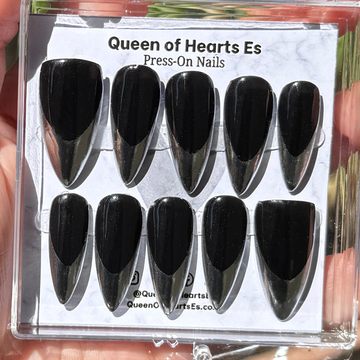 Get ready for "The Steel Tips" and embrace dark glamour with these stunning handmade press-on nails, featuring a black base and delicate, chrome tip design.&nbsp;