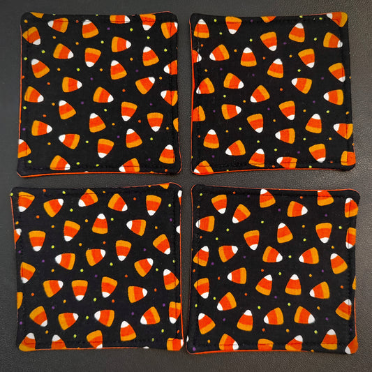 Celebrate the sweeter side of the spooky season all year round with this matching set of 4 handmade cotton coasters. Perfectly capturing a playful, retro autumn kitsch aesthetic, these drink mats bring a vibrant, nostalgic pop of color to any alternative home decor collection.