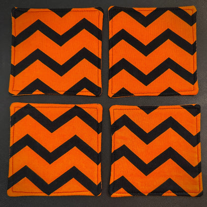 Infuse your home with a bold pop of graphic design and alternative flair with this set of 4 handmade cotton coasters. Showcasing a striking, wide zigzag pattern, these drink mats bring together a mid-century retro vibe with an unmistakably edgy, dark aesthetic.