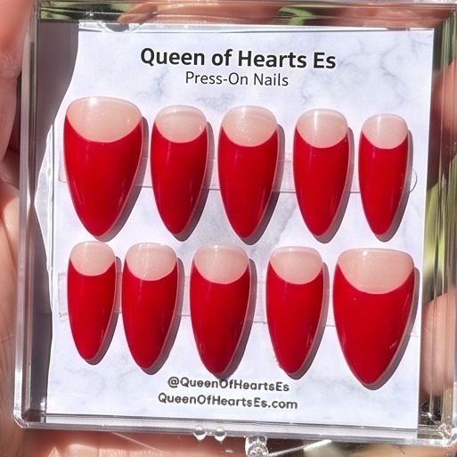 Get ready for "The Red Half Moon" and embrace dark glamour with these stunning handmade press-on nails, featuring a nude base and delicate, red half moon design.&nbsp;