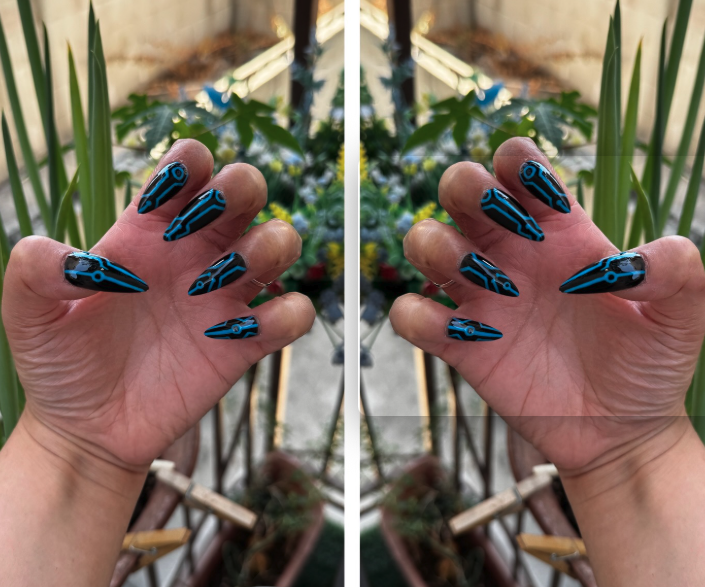Get ready for "The Grid" and step into the future with custom, hand-painted press-on nails inspired by high-tech cyber circuitry and sci-fi aesthetic. Featuring slick, high-gloss black bases layered with ultra-crisp circuit linework, "The Grid" charges up under UV or sunlight to emit a vivid, electric glow when the lights go down. Available in both blue and red glow finishes!