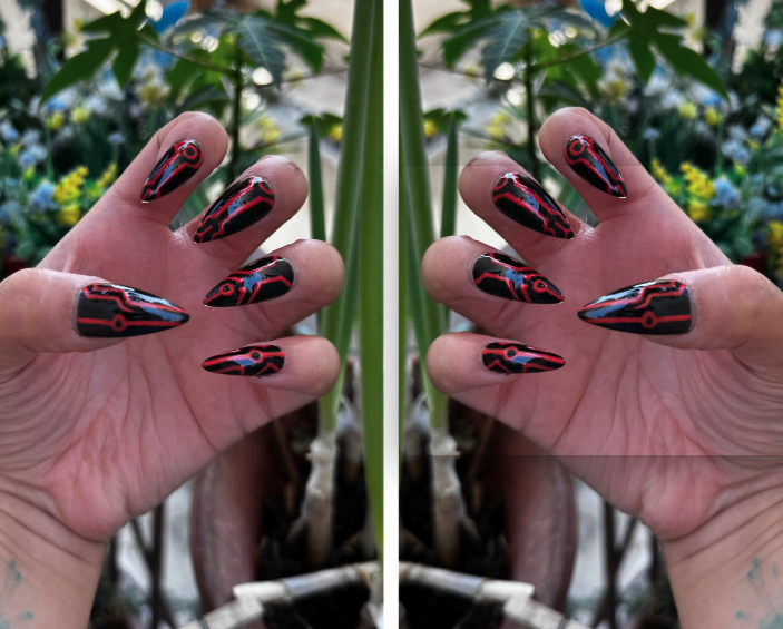 Get ready for "The Grid" and step into the future with custom, hand-painted press-on nails inspired by high-tech cyber circuitry and sci-fi aesthetic. Featuring slick, high-gloss black bases layered with ultra-crisp circuit linework, "The Grid" charges up under UV or sunlight to emit a vivid, electric glow when the lights go down. Available in both blue and red glow finishes!