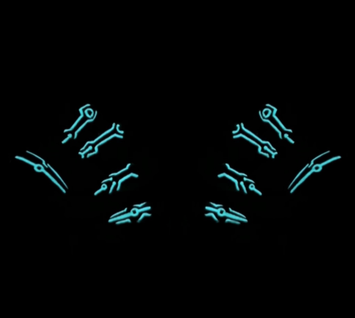 Get ready for "The Grid" and step into the future with custom, hand-painted press-on nails inspired by high-tech cyber circuitry and sci-fi aesthetic. Featuring slick, high-gloss black bases layered with ultra-crisp circuit linework, "The Grid" charges up under UV or sunlight to emit a vivid, electric glow when the lights go down. Available in both blue and red glow finishes!