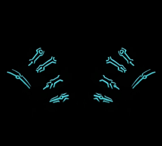 Get ready for "The Grid" and step into the future with custom, hand-painted press-on nails inspired by high-tech cyber circuitry and sci-fi aesthetic. Featuring slick, high-gloss black bases layered with ultra-crisp circuit linework, "The Grid" charges up under UV or sunlight to emit a vivid, electric glow when the lights go down. Available in both blue and red glow finishes!