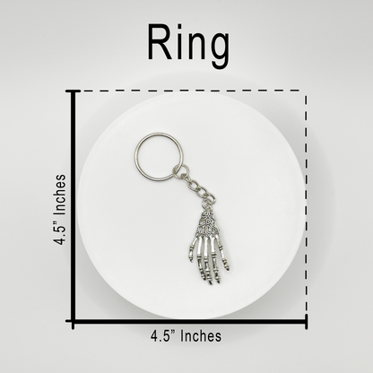 Grasp your style with our spooky skeleton hand charm! This unique, durable, and versatile accessory is perfect for horror fans and dark style lovers. Attach it to your bag, purse, or backpack for a touch of the macabre.