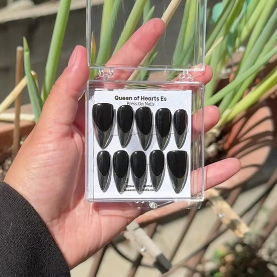 Get ready for "The Steel Tips" and embrace dark glamour with these stunning handmade press-on nails, featuring a black base and delicate, chrome tip design.&nbsp;