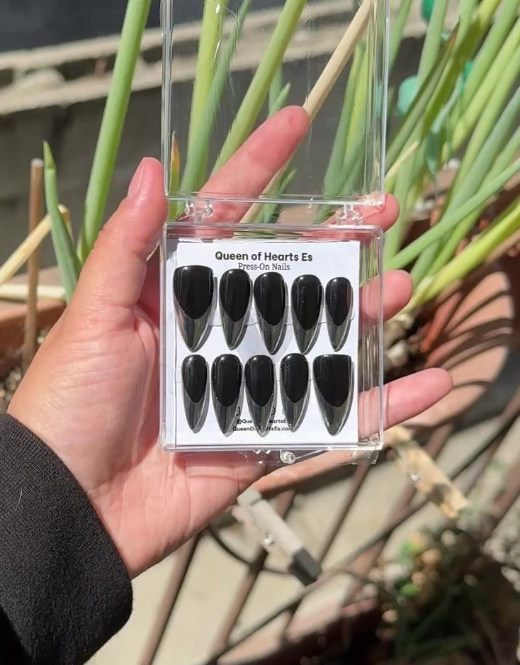 Get ready for "The Steel Tips" and embrace dark glamour with these stunning handmade press-on nails, featuring a black base and delicate, chrome tip design.&nbsp;