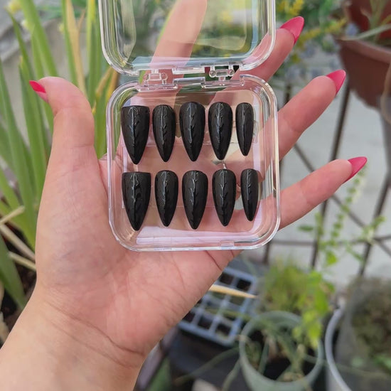 Get ready for "Black Web" with these stunning, spiderweb design press-on nails. Featuring a matte black base and a glossy black web. Each set is a miniature work of art, meticulously designed and hand-painted, adding a unique flair to any occasion. No time for salon appointments? Say hello to instant glamour that’s ready whenever you are. Our durable, high-quality press-ons offer a flawless, comfortable fit and are designed to last.