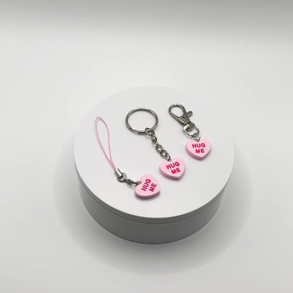 Add a touch of sweetness to your everyday! Our pink candy heart phone charm and keychain is the perfect accessory for Valentine’s Day and beyond. Cute, durable, and versatile, it’s the perfect gift for yourself or a loved one.