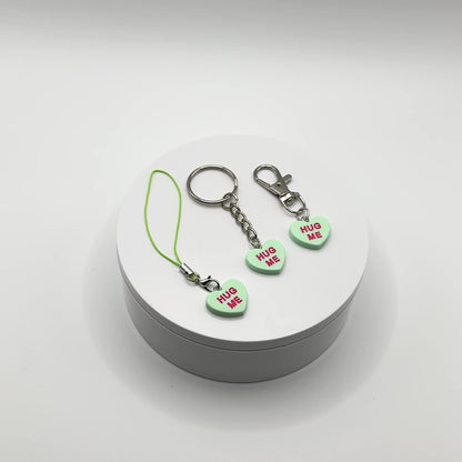 Add a touch of sweetness to your everyday! Our green candy heart phone charm and keychain is the perfect accessory for Valentine’s Day and beyond. Cute, durable, and versatile, it’s the perfect gift for yourself or a loved one.