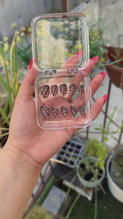 Get ready for "Nude Web" with these stunning, spiderweb design press-on nails. Featuring a nude base and black web with a matte finish. Each set is a miniature work of art, meticulously designed and hand-painted, adding a unique flair to any occasion. No time for salon appointments? Say hello to instant glamour that’s ready whenever you are. Our durable, high-quality press-ons offer a flawless, comfortable fit and are designed to last.