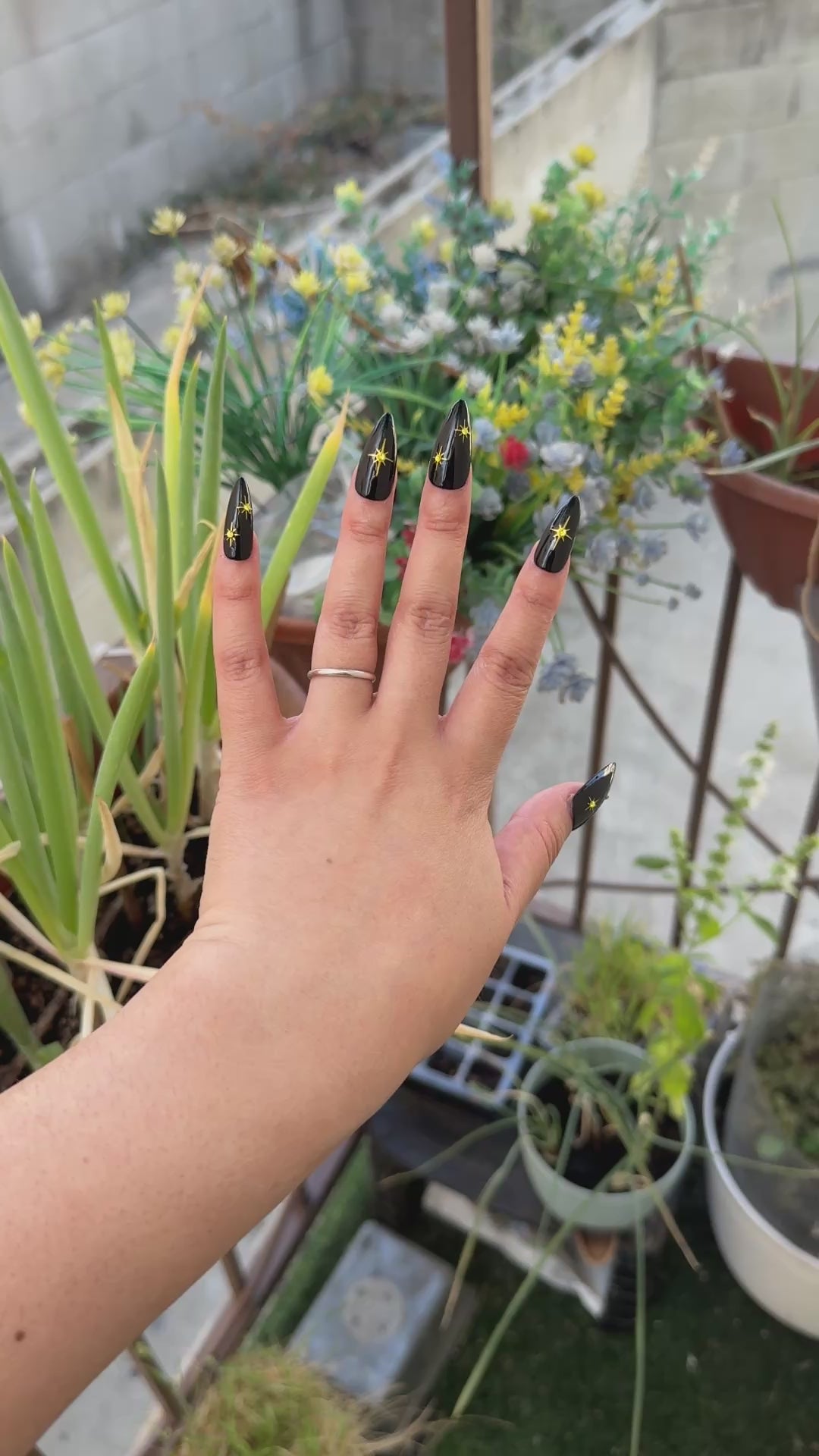 Get ready for "The Witching Hour" with these stunning, celestial press-on nails. Featuring a mysterious, deep black base and shimmering gold stars, this set captures the magic of a midnight sky. Each set is a miniature work of art, meticulously designed and hand-painted, adding a unique flair to any occasion. No time for salon appointments? Say hello to instant glamour that’s ready whenever you are. Our durable, high-quality press-ons offer a flawless, comfortable fit and are designed to last.